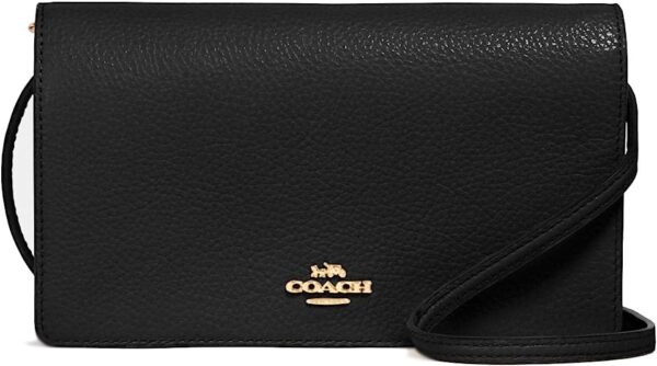 Brand: COACH Coach Women's Anna Foldover Crossbody Clutch (Black) 4.6 4.6 out of 5 stars    385 ratings | 10 answered questions Amazon's Choice for "bolsos coach para mujer originales" $134.24 $100.65 Shipping & Import Fees Deposit to Nigeria Details  Available at a lower price from other sellers that may not offer free Prime shipping.